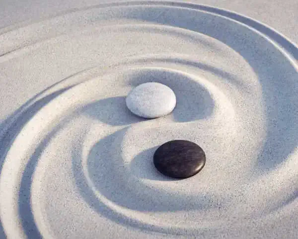 2 Stones In Sand forming Ying Yang